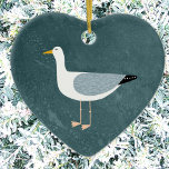 Cute Seagull Ceramic Ornament<br><div class="desc">Een juktige zeemeeuw die staat bij de diepe groene oceaan. Ideaal voor mensen die van zassige vogels houden en voor de kust. Originele kunst van Nic Squirrell.</div>
