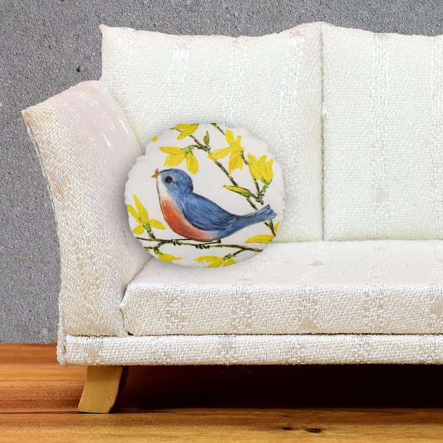 Cute Singing Blue Bird Tree Branch Rond Kussen (Little singing blue red bird on branch yellow flowers textured look white decorative pillow.)