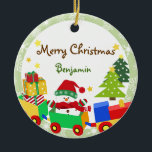 Cute Snowman in Speelgoed Train Kerstversiering Keramisch Ornament<br><div class="desc">De sneeuwman in de rode kersthoed en sjaal op een speelgoed trein die rood blauw,  groen en geel is. De achtergrond heeft bomen met sneeuwvlokken en sterren. Alle teksten in de voor- en achterkant van de versiering zijn aanpasbaar. Dit is digitale illustratie</div>