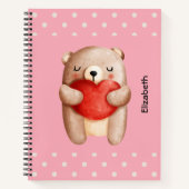 Cute Teddy Bear die een rood hart draagt Notitieboek (Voorkant)