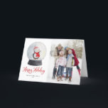 Cute Waterverf Penguin Snow Wereldbol Foto Feestdagen Kaart<br><div class="desc">prettige feestdagen! Stuur dit seizoen feestelijke vrolijkheid met deze aanpasbare fotovakantiekaart. Het bevat een grillig script en een waterverf illustratie van een sneeuwglobe met een schattige pinguïn in winteruitrusting. Personaliseer door een foto, namen, jaar en andere details toe te voegen. Deze waterverf pinguïn vakantie kaart is beschikbaar op andere kaarten....</div>