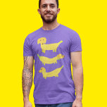 Cute Yellow Banana Dogs Graphic<br><div class="desc">Dit leuke grafische t-shirt bevat illustraties van drie honden gemaakt van gele bananen,  of bananenhonden.</div>