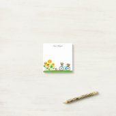 Cutkat en fiets met mand bloemen post-it® notes (Op bureau)