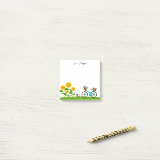 Cutkat en fiets met mand bloemen post-it® notes (Op bureau)