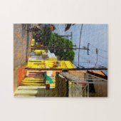 Cycling down Queen Street, Speightstown, Barbados Legpuzzel (Horizontaal)
