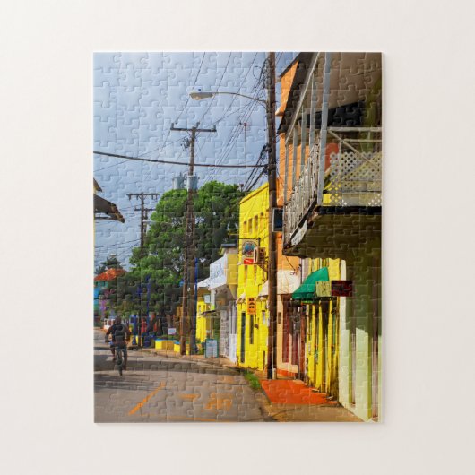 Cycling down Queen Street, Speightstown, Barbados Legpuzzel (Verticaal)