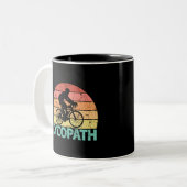 Cycopath Funny Cycling Tweekleurige Koffiemok (Voorkant links)