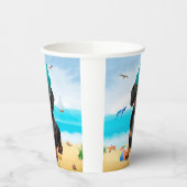 Dachshond op het strand papieren bekers (Links)