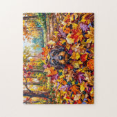 Dachshond rustend in kleurrijke herfstbladeren legpuzzel (Verticaal)