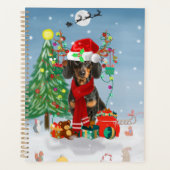 Dachshund Dog in sneeuw met kerstcadeaus Planner (Voorkant)