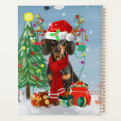 Dachshund Dog in sneeuw met kerstcadeaus Planner (Achterkant)