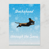Dachshund door de sneeuw briefkaart (Voorkant)