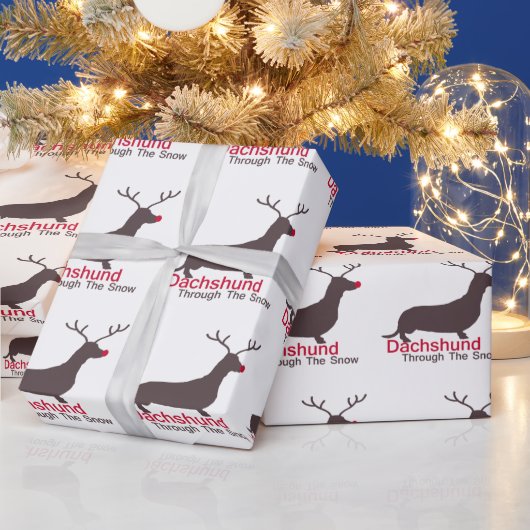 Dachshund door de sneeuw cadeaupapier (Feestdagen)