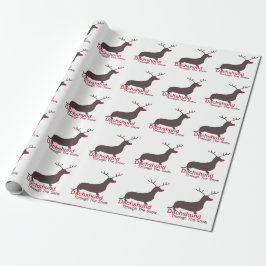 Dachshund door de sneeuw cadeaupapier