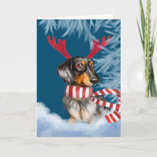 Dachshund door de sneeuw feestdagen kaart