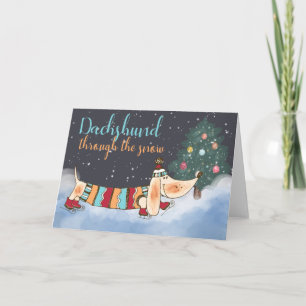 Dachshund door de sneeuw feestdagen kaart