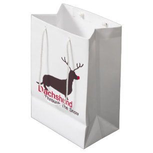 Dachshund door de sneeuw medium cadeauzakje