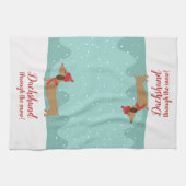 Dachshund door de sneeuwhanddoek theedoek (Horizontaal)
