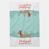 Dachshund door de sneeuwhanddoek theedoek (Verticaal)