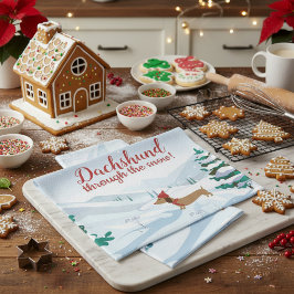 Dachshund door de sneeuwhanddoek theedoek