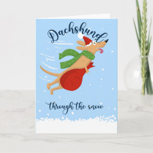 Dachshund door de sneeuwkaart kaart