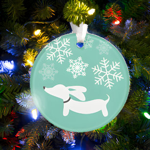 Dachshund door de sneeuwkerstboom ornament