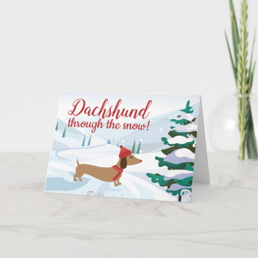 Dachshund door de Sneeuwkerstgroet Bedankkaart (Voorkant)
