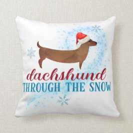 Dachshund door de sneeuwkerstman kussen