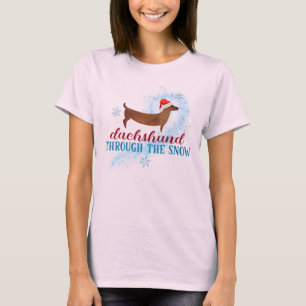 Dachshund door de sneeuwkerstman t-shirt