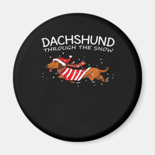 Dachshund door de sneeuwvloed met kerstmis magneet