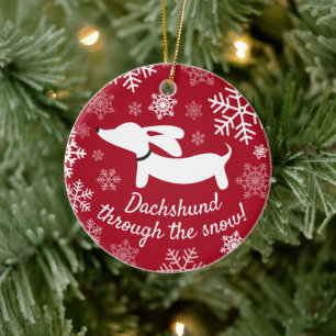 Dachshund door het Ornament van de sneeuwkerstboom