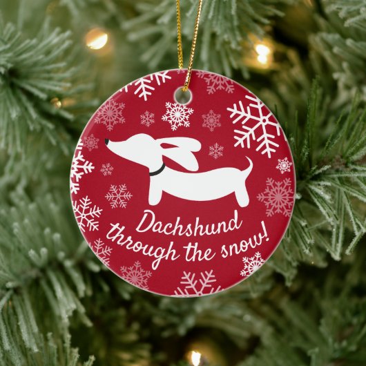 Dachshund door het Ornament van de sneeuwkerstboom (Boom)