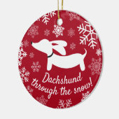 Dachshund door het Ornament van de sneeuwkerstboom (Links)