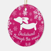 Dachshund door het Ornament van de sneeuwkerstboom (Links)