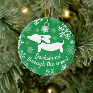 Dachshund door het Ornament van de sneeuwkerstboom
