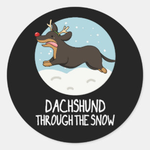 Dachshund doorheen de sneeuwkerst, donkere bg ronde sticker