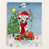 Dachshund-hond in de sneeuw met kerstcadeaus   planner (Voorkant)