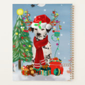 Dachshund-hond in de sneeuw met kerstcadeaus   planner (Achterkant)