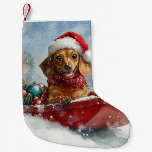 Dachshund-hond in slee laat het sneeuwen Kerstmis Kleine Kerstsok