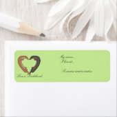 Dachshund-hondenkoppels houden van hartelabels etiket (Insitu)