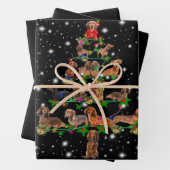 Dachshund-kerstboom met vlieglicht inpakpapier vel (In situ)