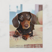 Dachshund Puppy zit op een sofa Briefkaart (Voorkant)