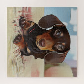 Dachshund Puppy zit op een sofa Legpuzzel (Horizontaal)