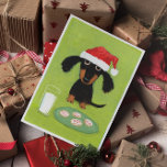 Dachshund Santa met melk en kerst van koekjes Feestdagen Kaart<br><div class="desc">Een grappige illustratie van een zwarte en beige Dachshund met een kersthoed, die voor een glas melk zit en een bord gevroren feestkoekjes. De binnentekst kan met uw eigen douanegroet worden gepersonaliseerd. Een perfecte vakantiekaart voor services voor huisdieren om klanten, vrienden en klanten aan te passen en te verzenden. Ideaal...</div>