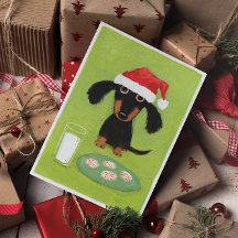 Dachshund Santa met melk en kerst van koekjes