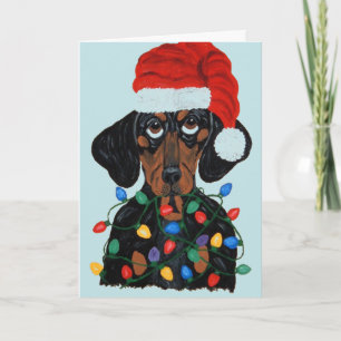 Dachshund Sinterklaas verstrikt in kerstlichtjes Kaart