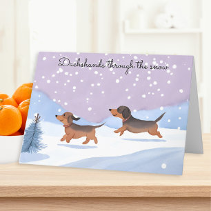 Dachshunds door de sneeuw worst hond kerst feestdagen kaart