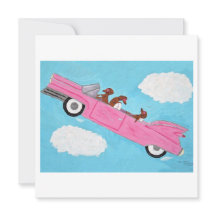 Dachshunds in een roze cabriolet in de lucht