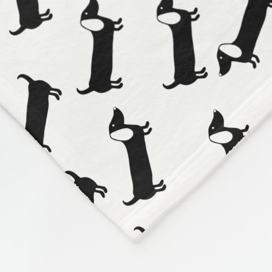 Dachshunds in zwart-wit fleece deken (Hoek)