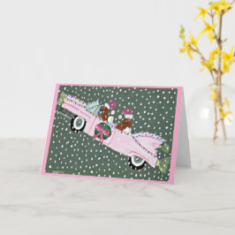 Dachshunds met Kerstmis in een roze cabriolet Kaart